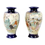 A pair of Japanese porcelain vases, early 20th century, a/f drilled for use as lamp bases, decorated