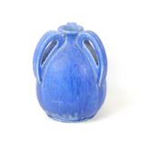 A Ruskin three-handled vase in blue, stamped 'Ruskin' to base, 17 by 22cm high.