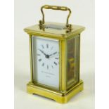 A brass carriage clock by Matthew Norman, circa 1980s, the white dial with black Roman numerals