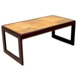 A retro Keith Eatwell tile topped coffee table, of rectangular form, 95.5 by 50 by 40.5cm high.