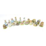 A collection of Beswick and Royal Albert Beatrix Potter figurines, comprising, three Royal Albert