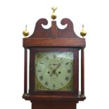 An early 19th century oak and crossbanded long case clock, twin train 8-day movement striking on a