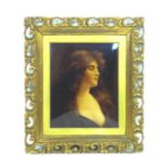 An early 20th century Christoleum portrait of a young lady, 25 by 20cm, in a pierced gilt frame,