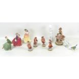 A group of 20th century european porcelain figurines, including four Volkstedter