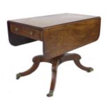 A Regency mahogany Pembroke table, the single drawer with brass knobs and cock beading, raised on