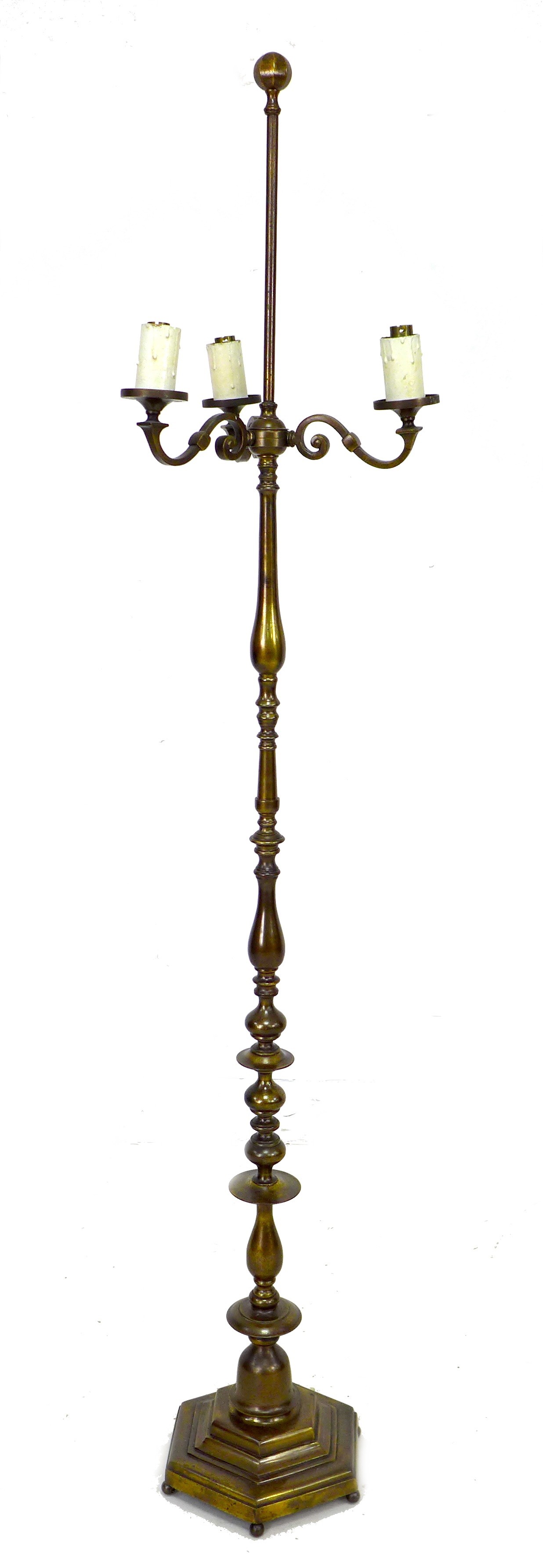 An early to mid 20th century brass standard lamp, with three S shaped branches, the knopped column