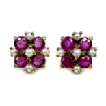 A pair of 9ct gold, ruby and pearl stud earrings, of quatrefoil design, 1.1 by 1.1cm, hallmarked