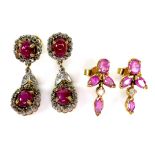 Two pairs of gold and ruby drop earrings, both unmarked but test as 9ct, 7.7g combined. (2)