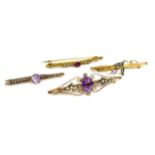 A group of four 9ct gold brooches set with amethysts and pearls, all Victorian/Edwardian, largest