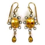 A pair of 9ct gold, pearl and yellow topaz drop earrings, 3.6cm long, 3.6g.