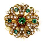 A 9ct gold, pearl and green stone pendant brooch, 2.5cm diameter, with safety chain, 4.3g.