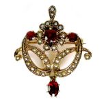 A 9ct gold, garnet and seed pearl pendant brooch, of scrolling design with garnet drop to base, 2.