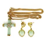 A 9ct gold, jade and diamond cross pendant, 3.1 by 2.3cm, on a 9ct gold chain, 29cm long fastened,