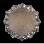 A Victorian silver tray, with shell mounts, raised upon four scroll feet, Daniel & Charles Houle,