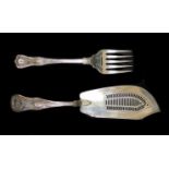 A matched set of Victorian silver fish servers, comprising a George IV silver pierced fish server,