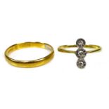 A 22ct gold ring, size Q/R, 2.3g, together with a gold three stone diamond ring, the illusion set
