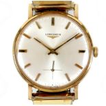 A Longines 9ct gold gentleman's wristwatch, circa 1970s, circular silvered dial with gold batons,