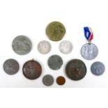 A group of commemorative medallions and tokens