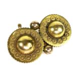 A Victorian 18ct gold brooch of double sphere design and rope twist detailing, 3.6cm across, with