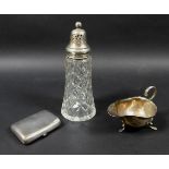 A group of three silver items, comprising a cut glass silver topped sugar sifter, 18cm high, a