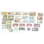 A group of thirty three GB and World bank notes