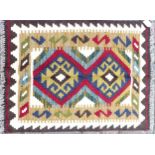 A Maimana Kilim rug, with two lozenges upon a caucasian ground to its centre, and caucasian and dark