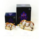 Two limited edition Royal Crown Derby paperweights, modelled on a Black Rhino, 12.5cm high, together