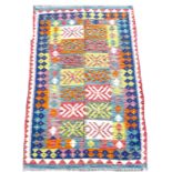 A Chobi Kilim rug, the multicolour ground with fourteen rectangular panels, and stylized geometric