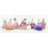 A group of seven Royal Doulton figures, comprising 'The Bedtime Story', HN2059, 12.5cm high, '