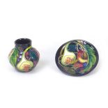 Two Moorcroft pottery Queens pattern pieces, comprising a small baluster vase, 8 by 8cm high, with