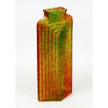 An Art Deco style mottled red and green glass vase, with stepped relief design, 13 by 6 by 32cm