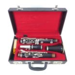A Boosey & Hawkes rosewood five piece clarinet, with white metal mounts, serial number '173867'