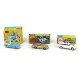 Three Dinky Toys die-cast toy models, comprising a James Bond DB5 in gold, a 447 Walls Ice Cream