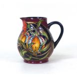 A Moorcroft pottery Pleuriana pattern water jug, by Rachel Bishop, with impressed marks to its base,