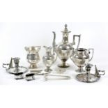 A group of silver plated wares, including a three piece coffee set with engraved decoration,