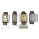 Four Art Deco wall light shades, each consisting of individual tubular glass inserts fitted within