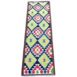 A Maimana Kilim runner, with diamond patterned ground, yellow, red, blue, green, and white,