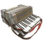 A vintage Alvari piano accordion, cased, in working order.