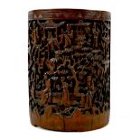 A Chinese bamboo brush pot (bitong), 19th century, of cylindrical form, carved in relief with a