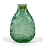A Chinese carved glass scent bottle, depicting an eagle amongst scrolling clouds, incised mark to