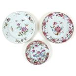 A group of three Chinese famille rose porcelain plates, Qing Dynasty, 18th century, one decorated in