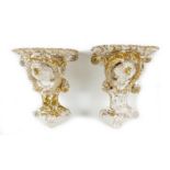 A pair of Staffordshire pottery creamware wall brackets, late 19th century, each modelled with a