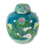 A Chinese porcelain ginger jar and cover, in the style of Wang Bingrong Zuo, with applied lotus