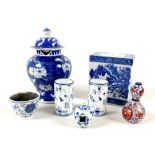 A collection of Chinese & Japanese porcelain, comprising a Kangxi style tea bowl, a cracked ice