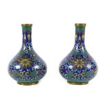 A pair of small Chinese cloisonne vases, early to mid 20th century, decorated in Ming style with