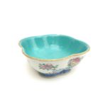 A Chinese porcelain pedestal bowl, of four lobed form