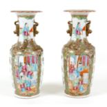 A pair of Canton porcelain vases, mid to late 19th century, typically decorated, each 10 by 25cm