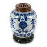 A Chinese porcelain vase, Qing Dynasty, 19th century, the ovoid form painted in Ming style