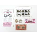 A small group of Chinese coins and banknotes, comprising two silver proof 5 dollar coins, '5000