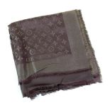A Louis Vuitton pashmina shawl, brown/gold logo pattern, purportedly purchased at Louis Vuitton in